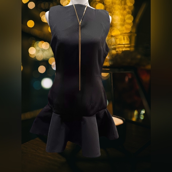 PrettyLittleThing Dresses & Skirts - PrettyLittleThing Black Peplum Hem Sleeveless Dress